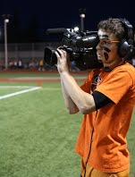 CT&E Student films a game with professional video camera
