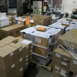 Boxes full of new curriculum materials in the warehouse