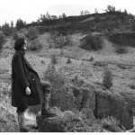 man photo on landscape black and white
