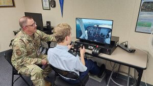 Student and instructor on flight sim