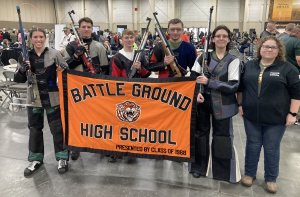 BGHS students with air rifles and banner