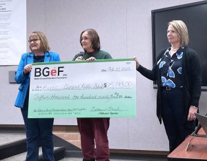 BGEF presents check to battle ground school board