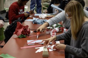 Students work on crafts for a holiday event